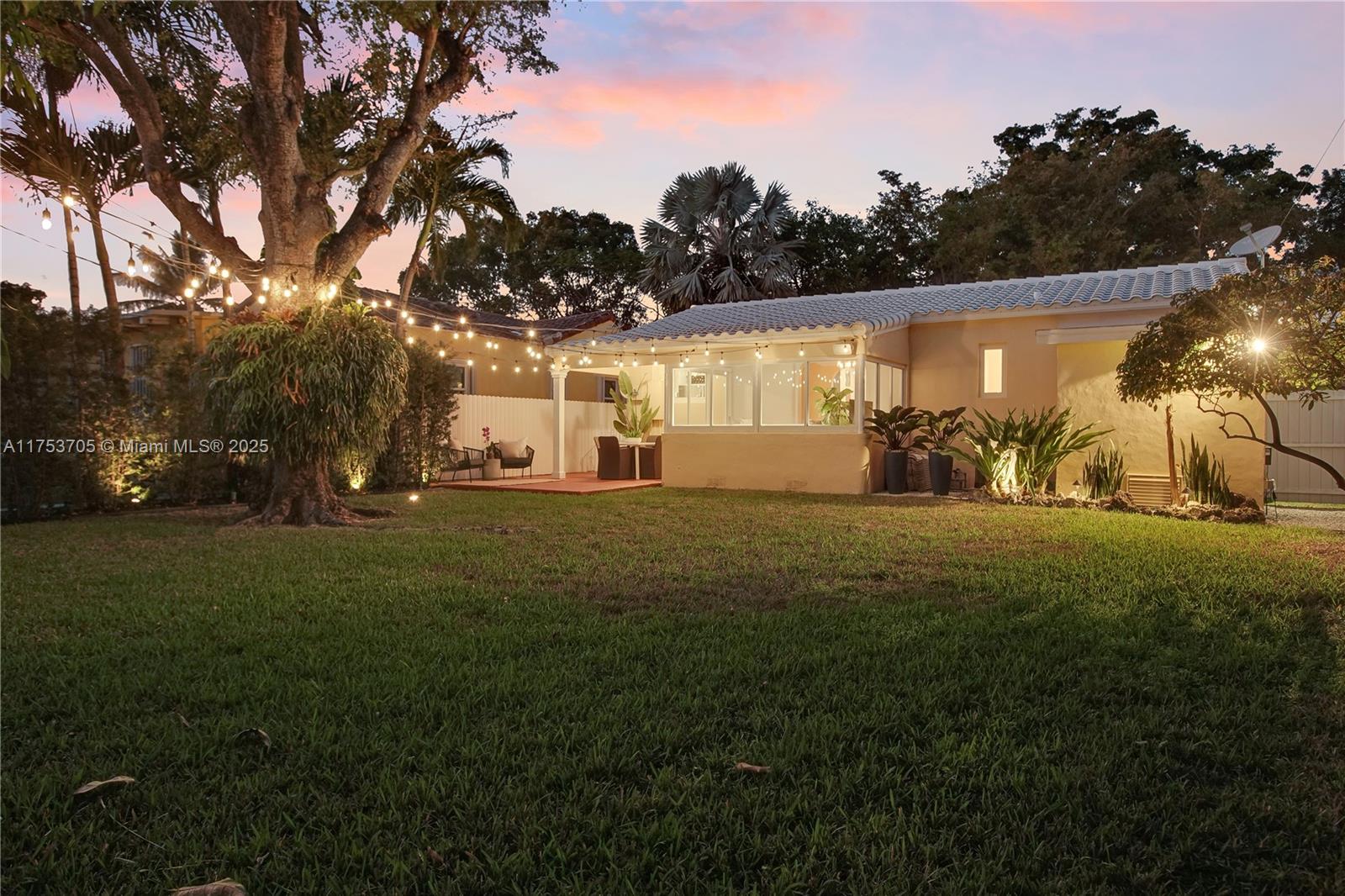 1926 Southwest 17th Terrace Miami, FL 33145 - Photo 29 of 38 a front view of a house with garden
