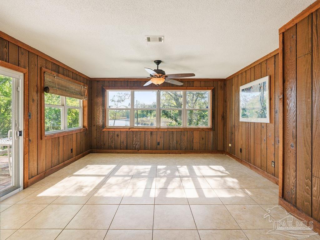 609 Dog Track Road Pensacola, FL 32506 - Photo 11 of 22 a view of an empty room with a window