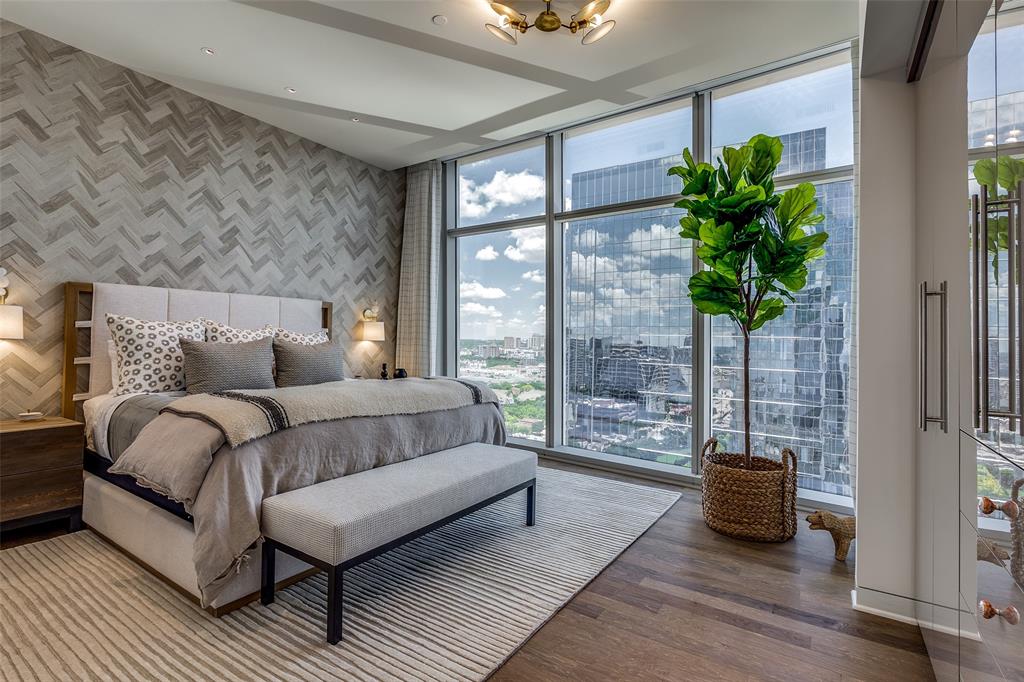1918 Olive Street, Unit 2002 Dallas, TX 75201 - Photo 18 of 29 a living room with furniture and a potted plant