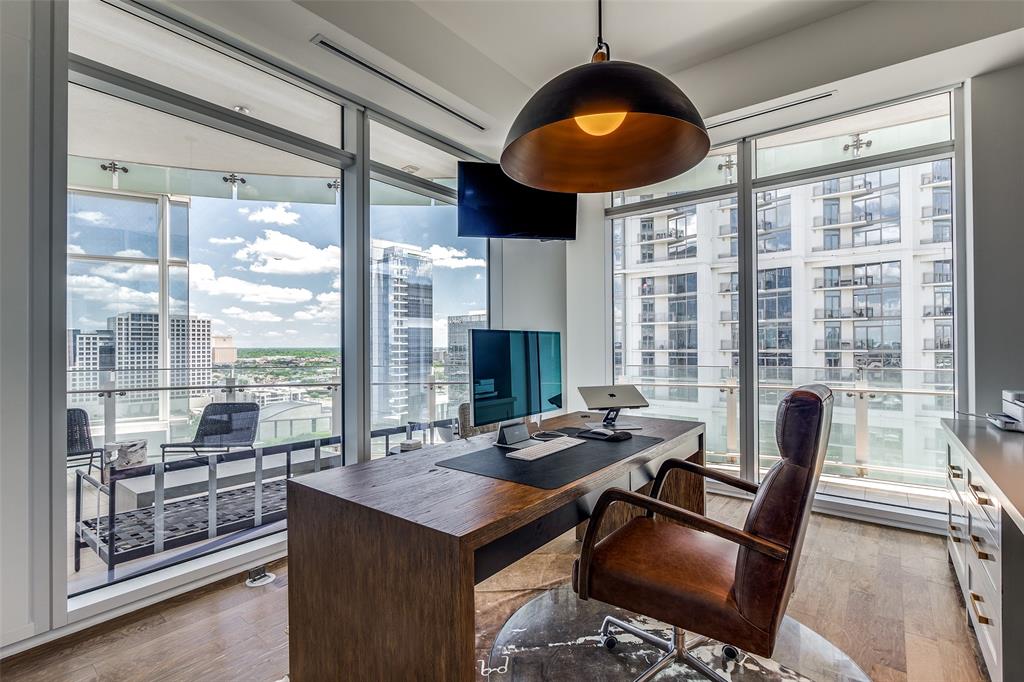 1918 Olive Street, Unit 2002 Dallas, TX 75201 - Photo 22 of 29 a view of a dining room with furniture window and outside view