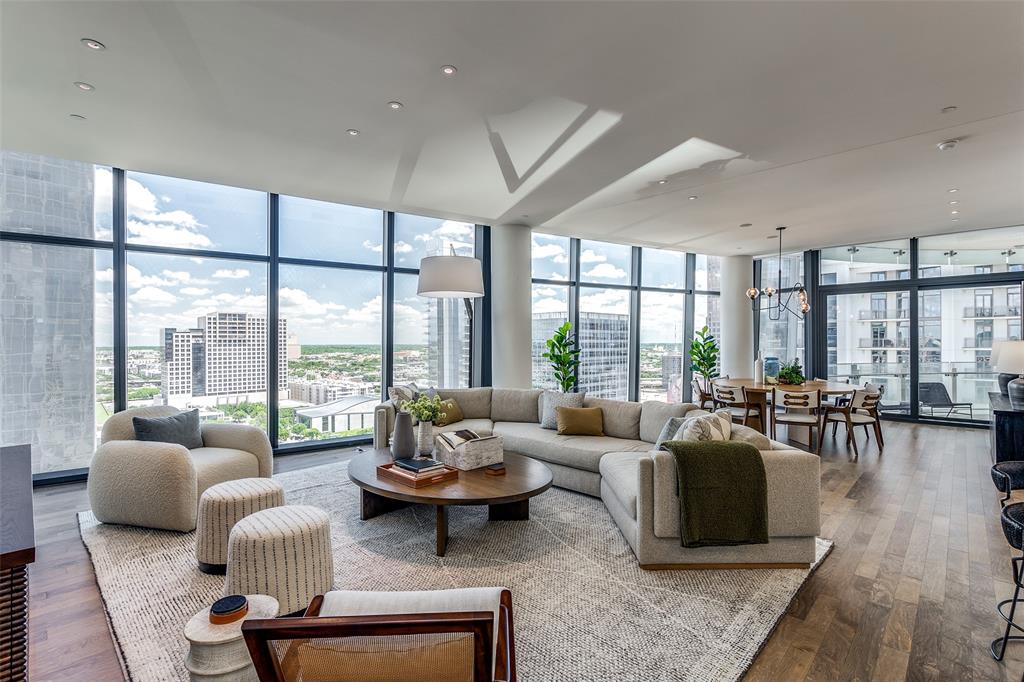 1918 Olive Street, Unit 2002 Dallas, TX 75201 - Photo 8 of 29 a living room with furniture and a large window