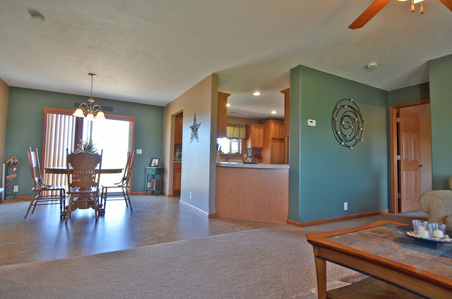3503 East 10th Road Utica, IL 61373 - Photo 4 of 14 a view of a dining room with furniture and wooden floor