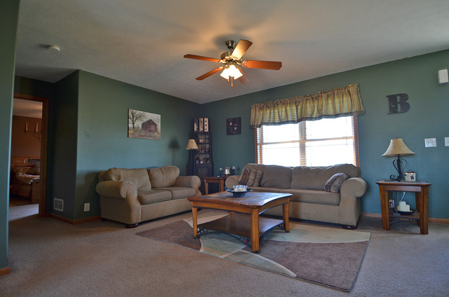 3503 East 10th Road Utica, IL 61373 - Photo 6 of 14 a living room with furniture and a large window