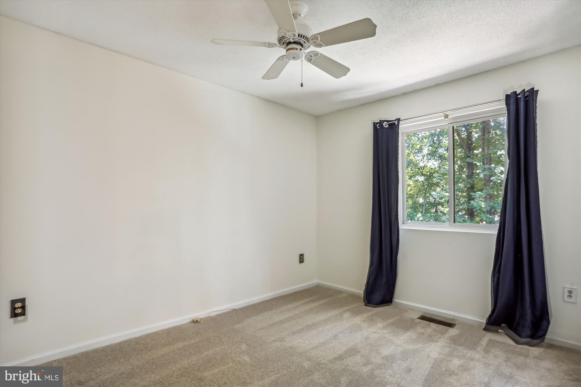 2301 Glade Bank Way Reston, VA 20191 - Photo 32 of 49 an empty room with windows