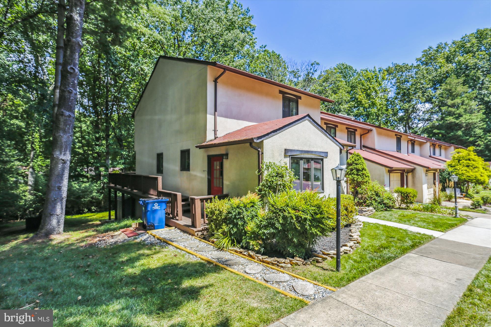 2301 Glade Bank Way Reston, VA 20191 - Photo 4 of 49 a view of a house with yard and plants