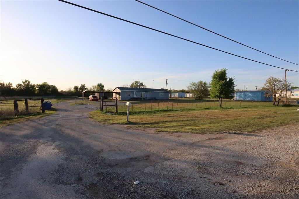 1437 West Loop 254 Ranger, TX 76470 - Photo 3 of 27 a view of a lake with houses