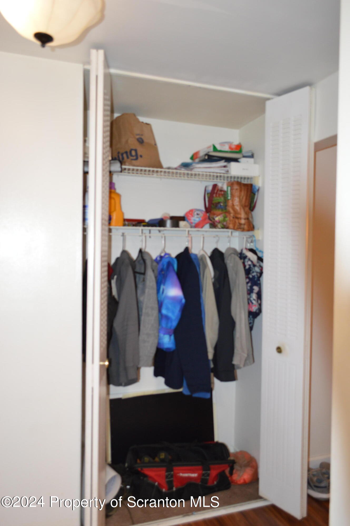 1704 Summit Pointe Scranton, PA 18508 - Photo 10 of 16 a view of walk in closet with clothes and shoes