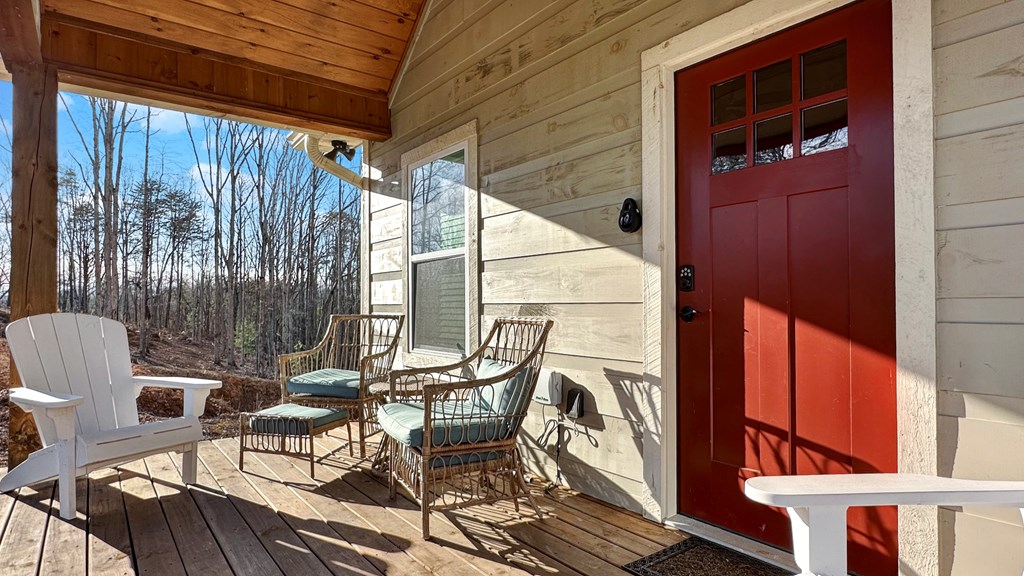 374 Prince Drive Morganton, GA 30560 - Photo 3 of 60 a view of a chairs and table in the balcony