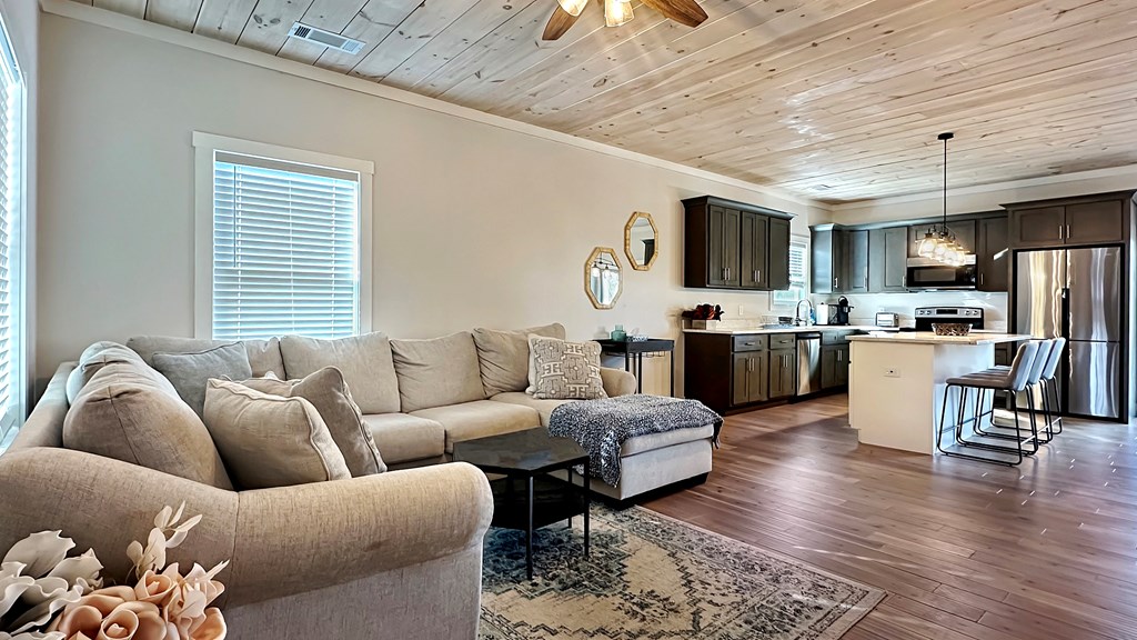 374 Prince Drive Morganton, GA 30560 - Photo 4 of 60 a living room with furniture kitchen view and a window