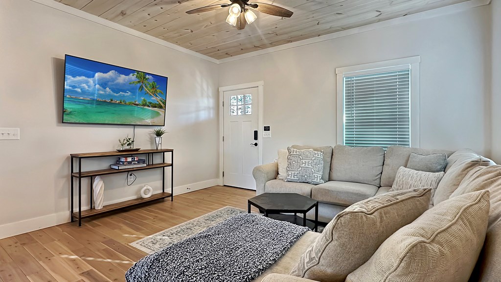 374 Prince Drive Morganton, GA 30560 - Photo 7 of 60 a living room with furniture and a flat screen tv