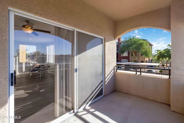 a kitchen with a refrigerator and a stove