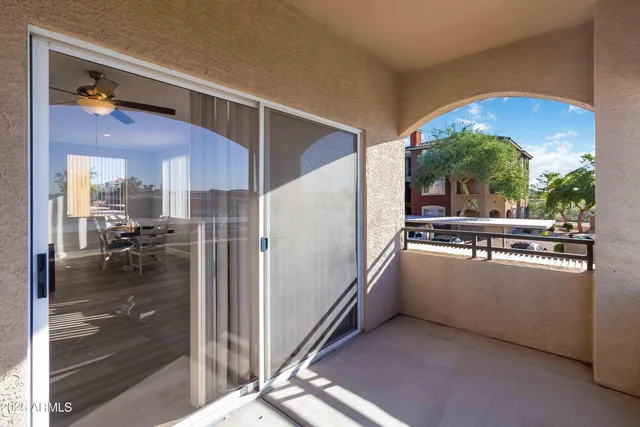 a kitchen with a refrigerator and a stove