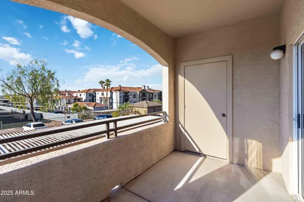 a view of swimming pool with seating area
