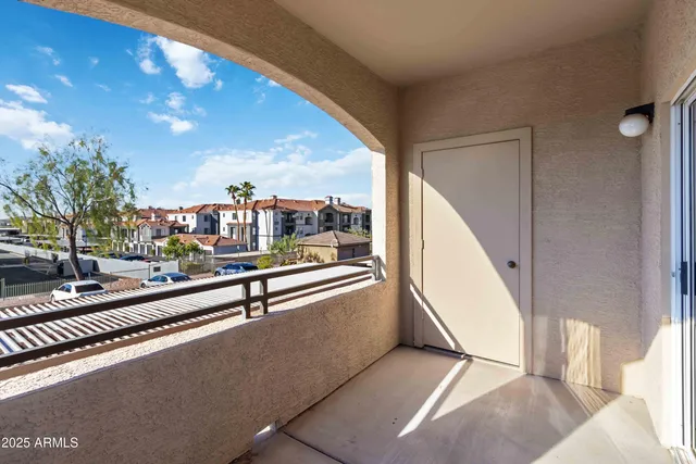 a view of swimming pool with seating area