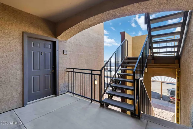 a view of front door with stairs