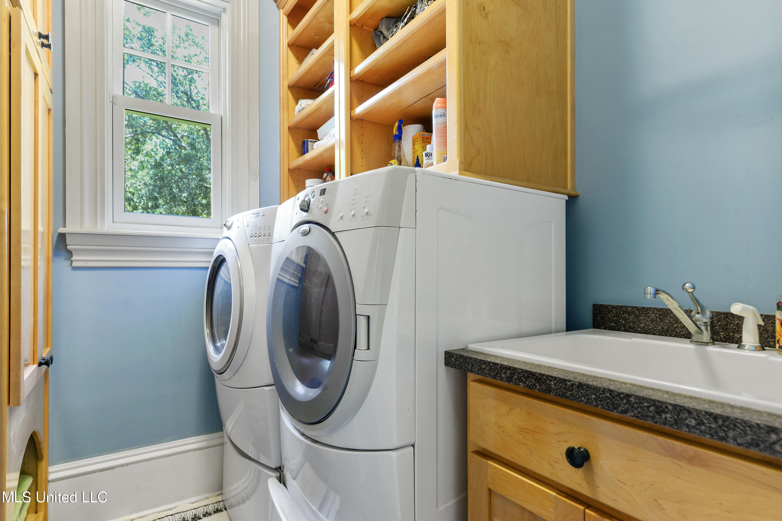 12001 Pointe Aux Chenes Road Ocean Springs, MS 39564 - Photo 45 of 143 Master laundry
