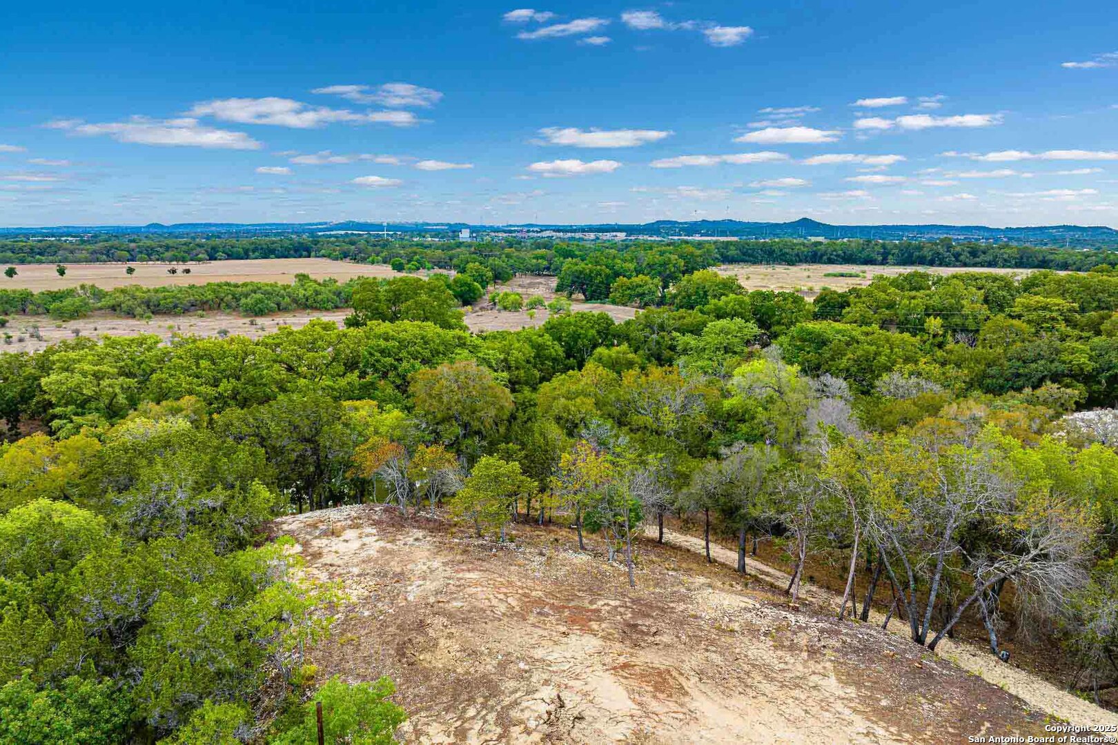 105 A Oleander Road Comfort, TX 78013 - Photo 4 of 25 a view of a yard with an outdoor space