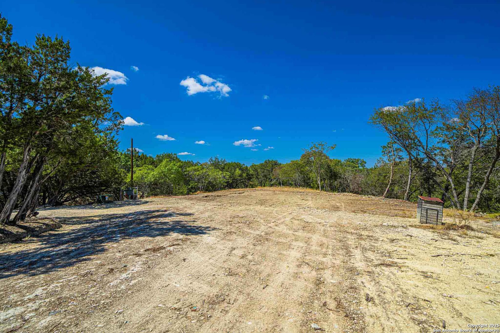 105 A Oleander Road Comfort, TX 78013 - Photo 10 of 25 a big yard with large trees