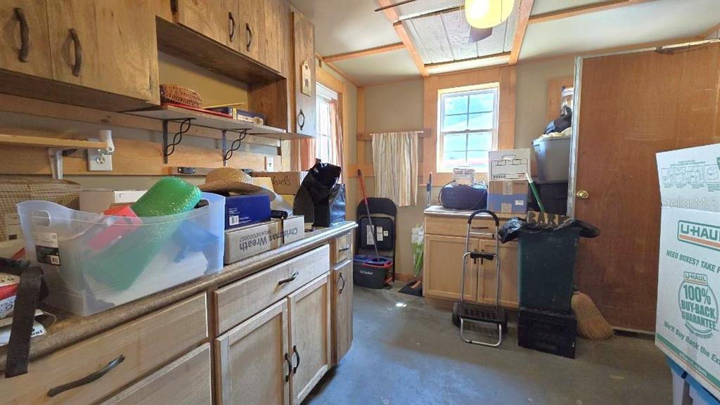 9430 Southwest 102nd Place Ocala, FL 34481 - Photo 29 of 51 a kitchen with a sink cabinets and appliances