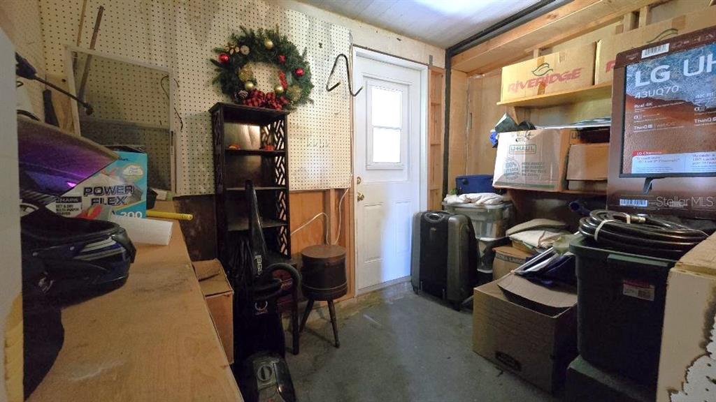 9430 Southwest 102nd Place Ocala, FL 34481 - Photo 32 of 51 a view of a hallway with workspace