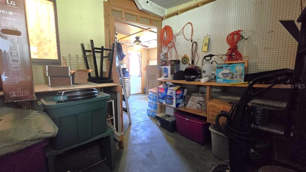 9430 Southwest 102nd Place Ocala, FL 34481 - Photo 33 of 51 a kitchen with a stove and a wooden floor