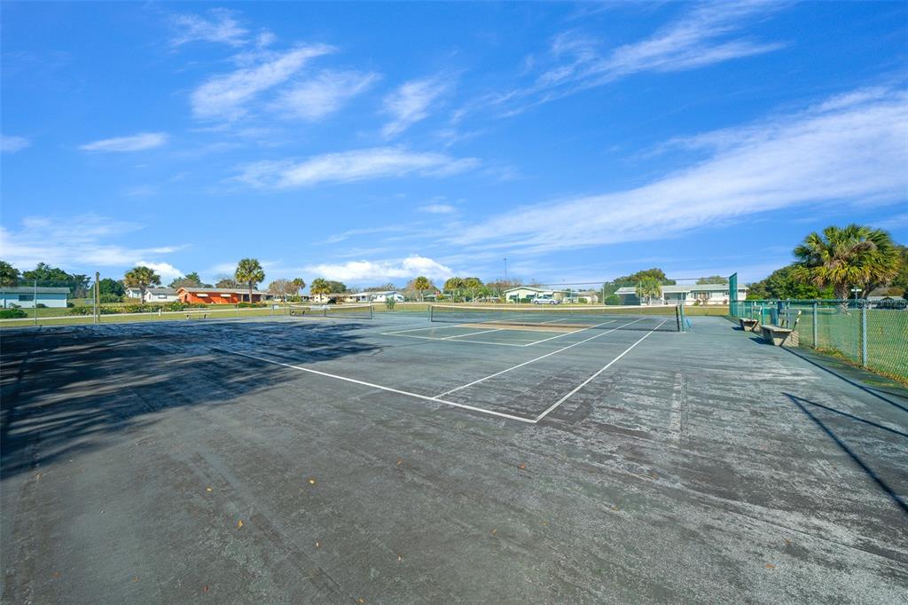 9430 Southwest 102nd Place Ocala, FL 34481 - Photo 50 of 51 a view of a tennis court