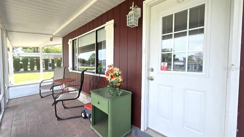 9430 Southwest 102nd Place Ocala, FL 34481 - Photo 6 of 51 a room with lots of windows and couches