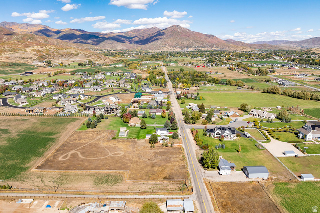 1160 Stringtown Road Midway, UT 84049 - Photo 24 of 26 Aerial perspective of suburban area with a mountainous background