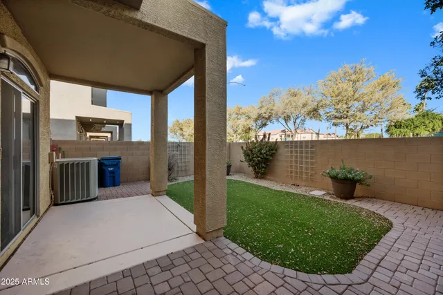 a view of a backyard with garden