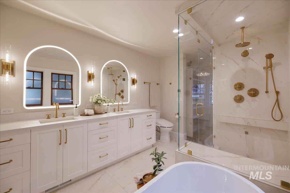 1210 North Harrison Boulevard Boise, ID 83702 - Photo 18 of 39 Full bathroom featuring double vanity, a marble finish shower, a bathtub, and recessed lighting