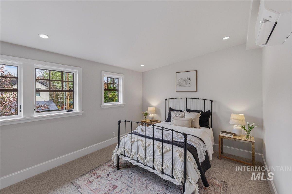 1210 North Harrison Boulevard Boise, ID 83702 - Photo 21 of 39 Bedroom featuring light colored carpet and recessed lighting