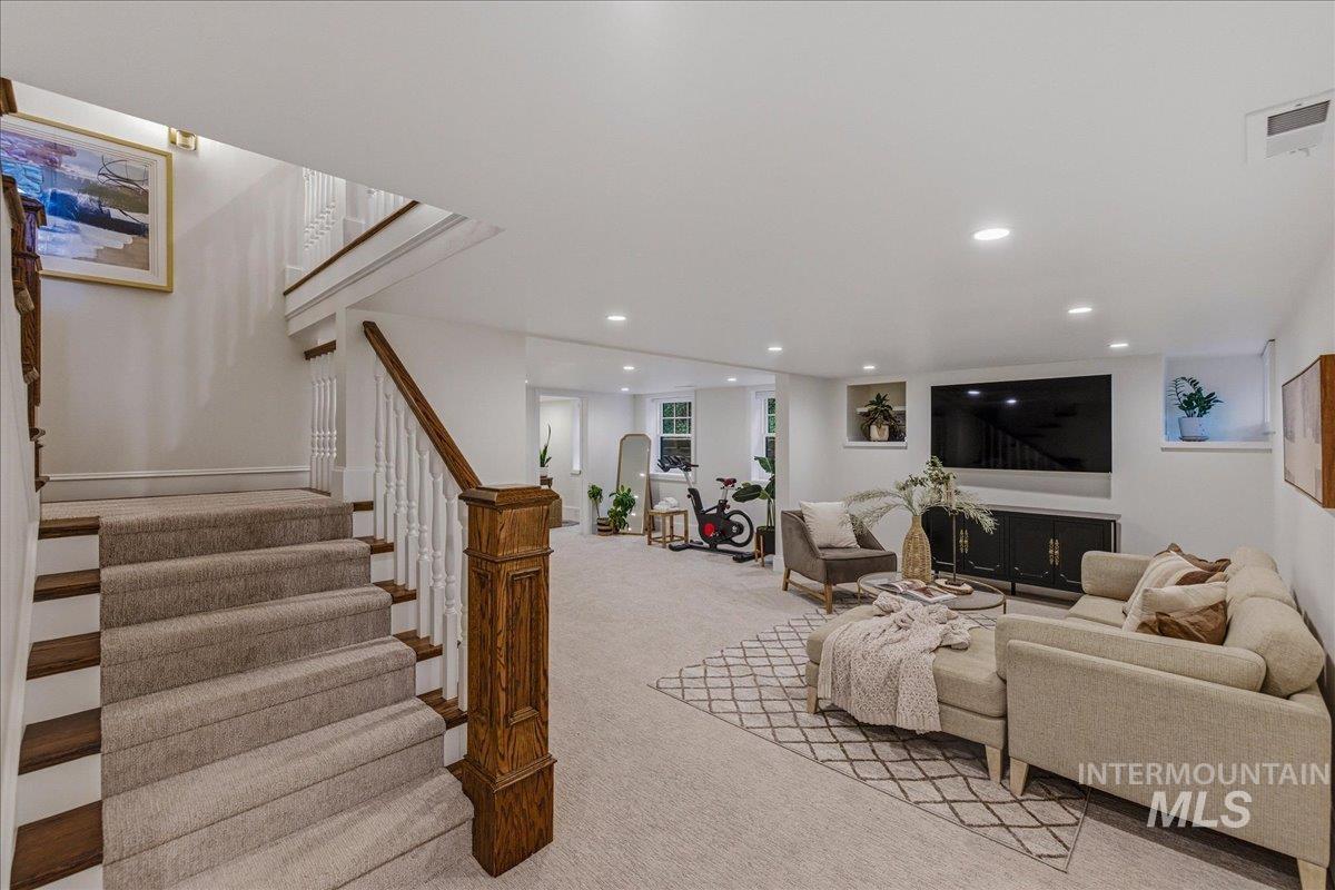 1210 North Harrison Boulevard Boise, ID 83702 - Photo 26 of 39 Living room featuring light colored carpet and recessed lighting
