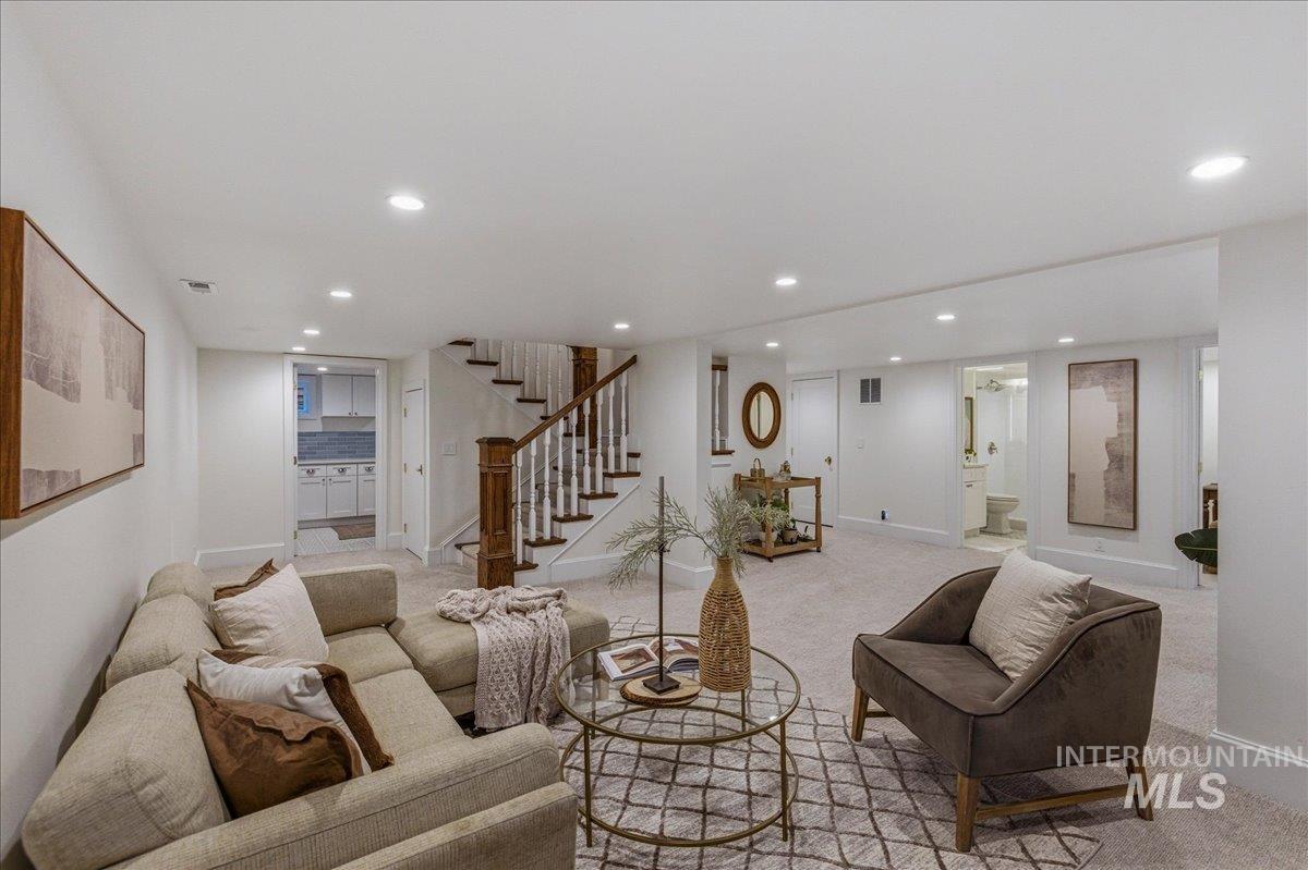 1210 North Harrison Boulevard Boise, ID 83702 - Photo 27 of 39 Living area with recessed lighting and light carpet