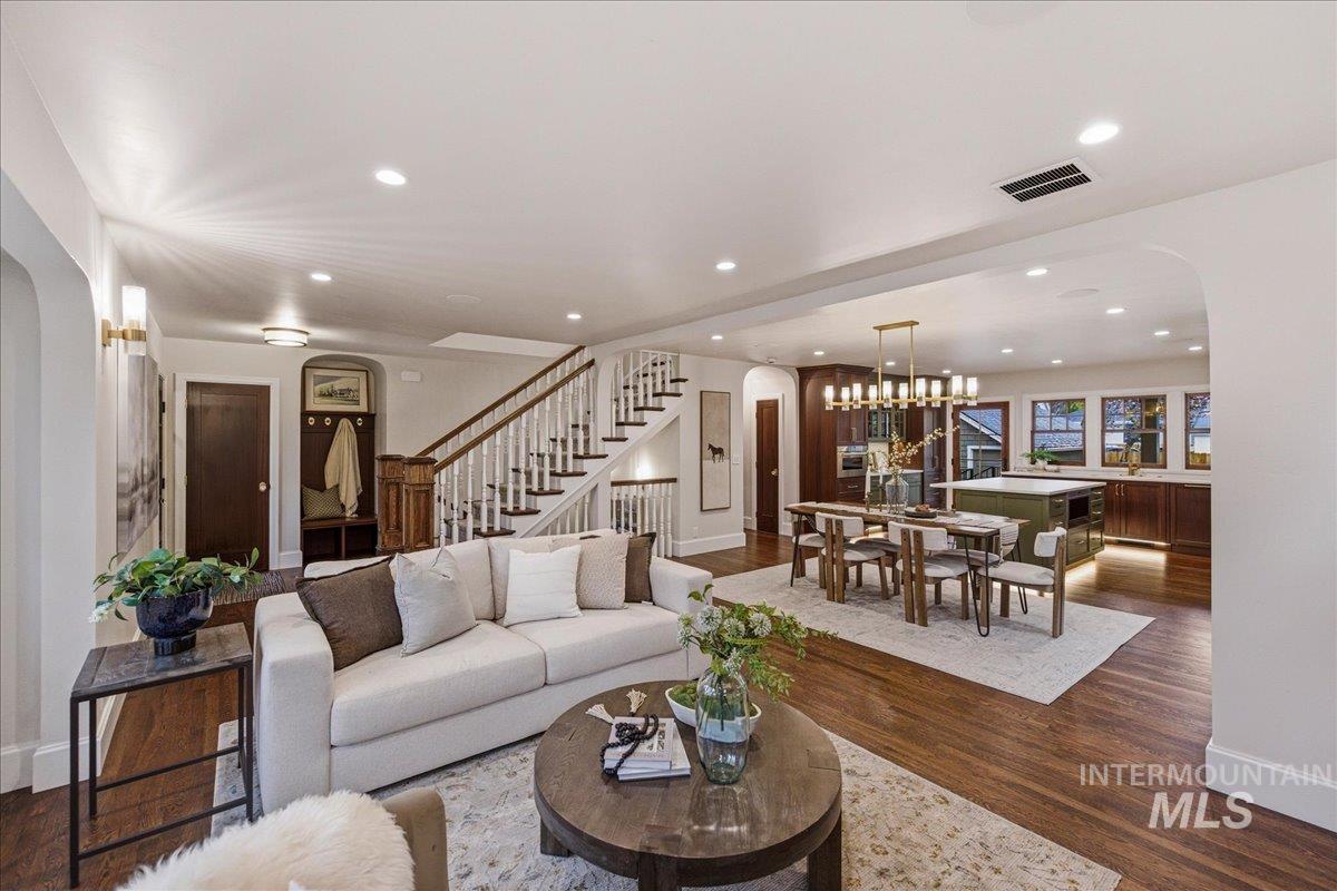 1210 North Harrison Boulevard Boise, ID 83702 - Photo 4 of 39 Living room with arched walkways, dark wood-style flooring, and recessed lighting