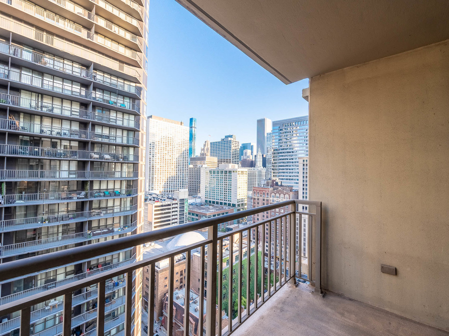 630 North State Street, Unit 2204 Chicago, IL 60654 - Photo 11 of 13 a city view from a balcony