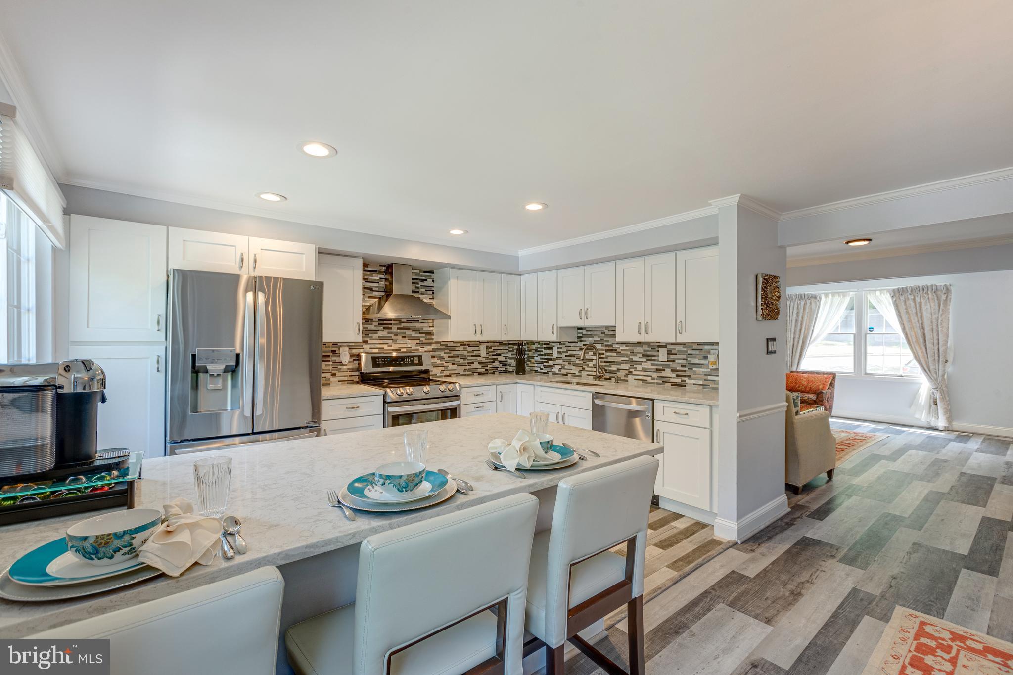 5835 Canvasback Road Burke, VA 22015 - Photo 14 of 45 Seating at Kitchen Counter