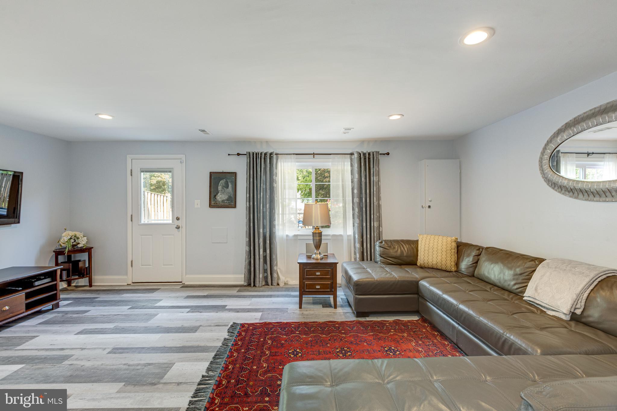 5835 Canvasback Road Burke, VA 22015 - Photo 30 of 45 Family Room Opens to Backyard