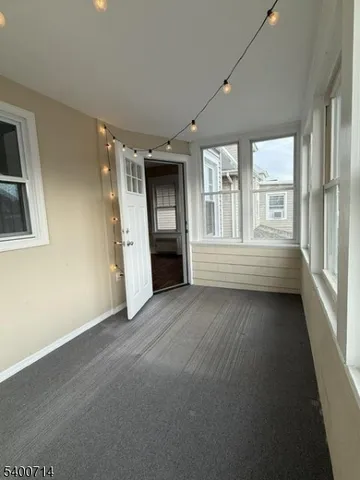 en empty room with windows