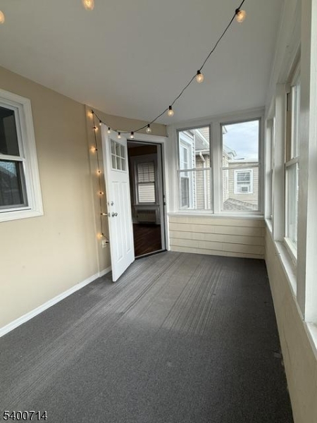 42 North Willow Street, Unit 2 Montclair, NJ 07042 - Photo 12 of 13 en empty room with windows