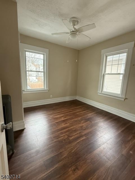 42 North Willow Street, Unit 2 Montclair, NJ 07042 - Photo 13 of 13 wooden floor in an empty room with a window