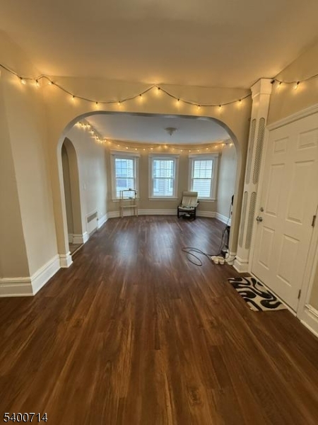 42 North Willow Street, Unit 2 Montclair, NJ 07042 - Photo 3 of 13 a view of a room with wooden floor and window