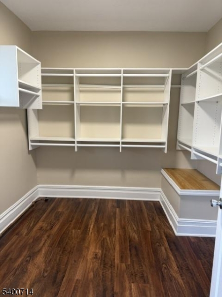 42 North Willow Street, Unit 2 Montclair, NJ 07042 - Photo 10 of 13 a view of an empty room with a window and wooden floor