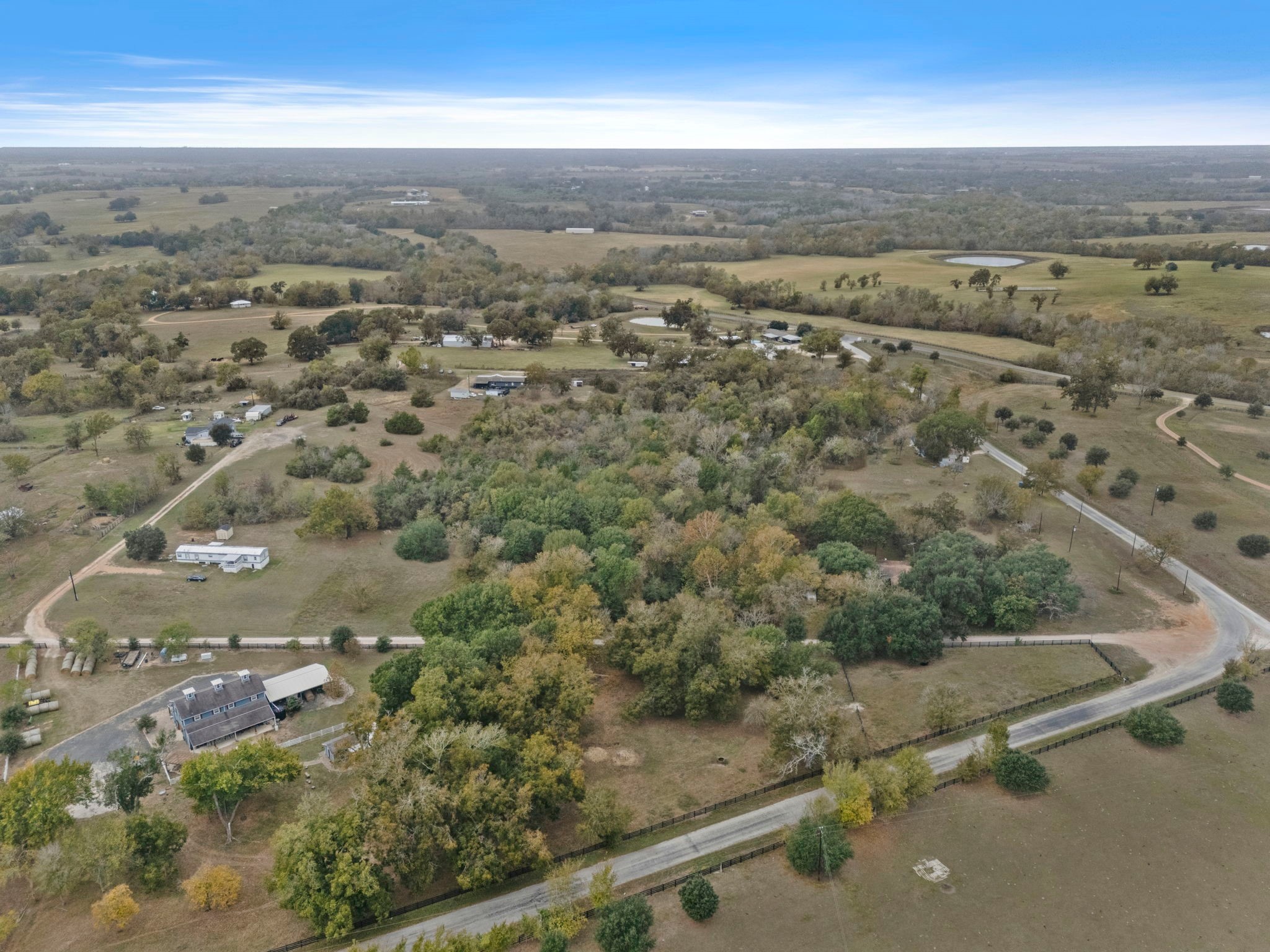 19344 Egypt Lane Washington, TX 77880 - Photo 3 of 13 an aerial view of mountains with green space