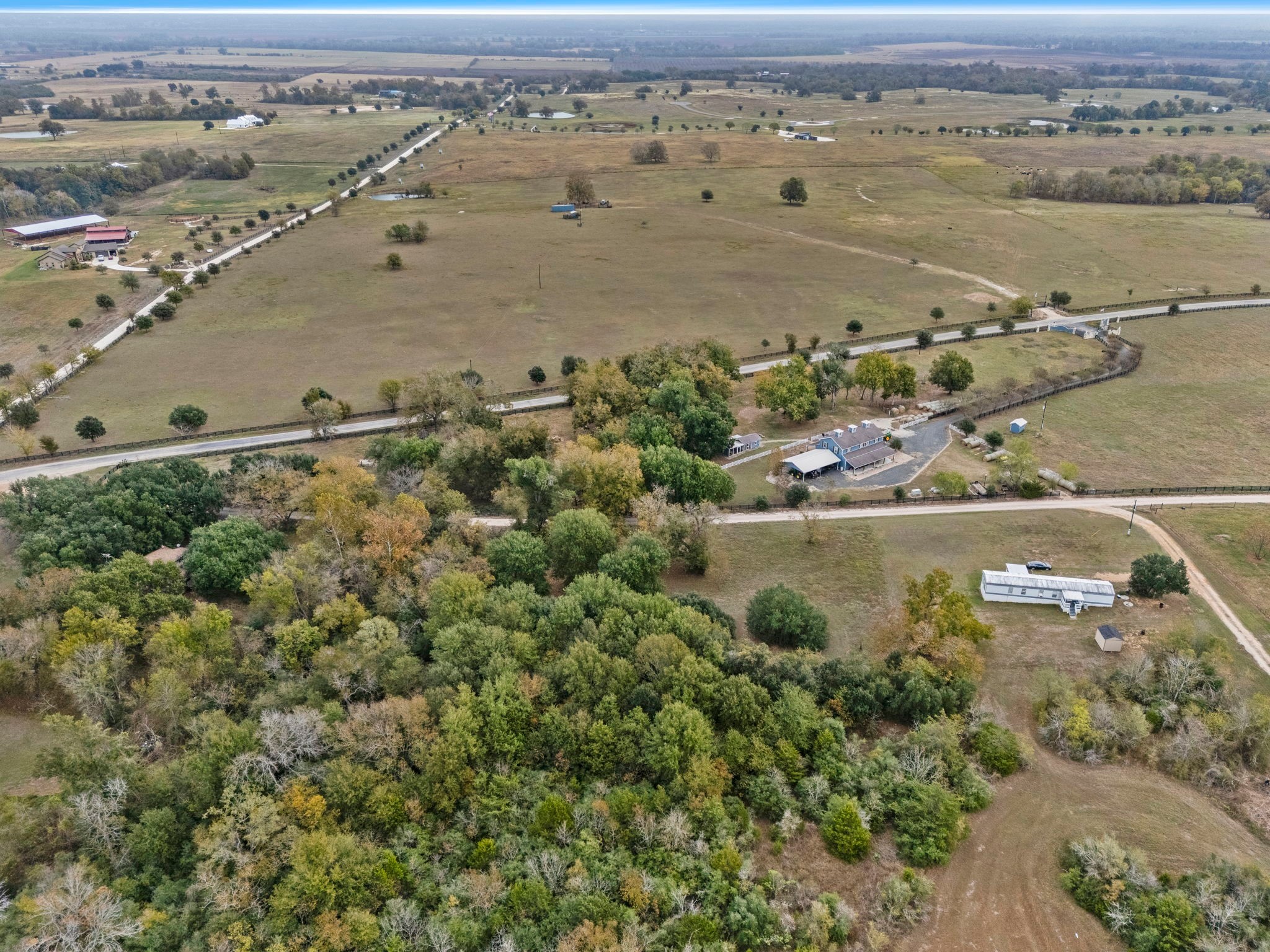 19344 Egypt Lane Washington, TX 77880 - Photo 6 of 13 an aerial view of residential houses with outdoor space