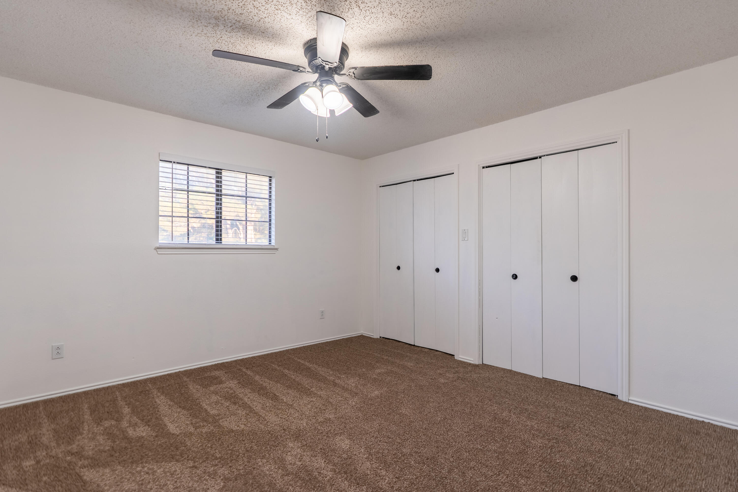512 North Grover Avenue Lubbock, TX 79416 - Photo 27 of 34 a view of a livingroom with a chandelier fan