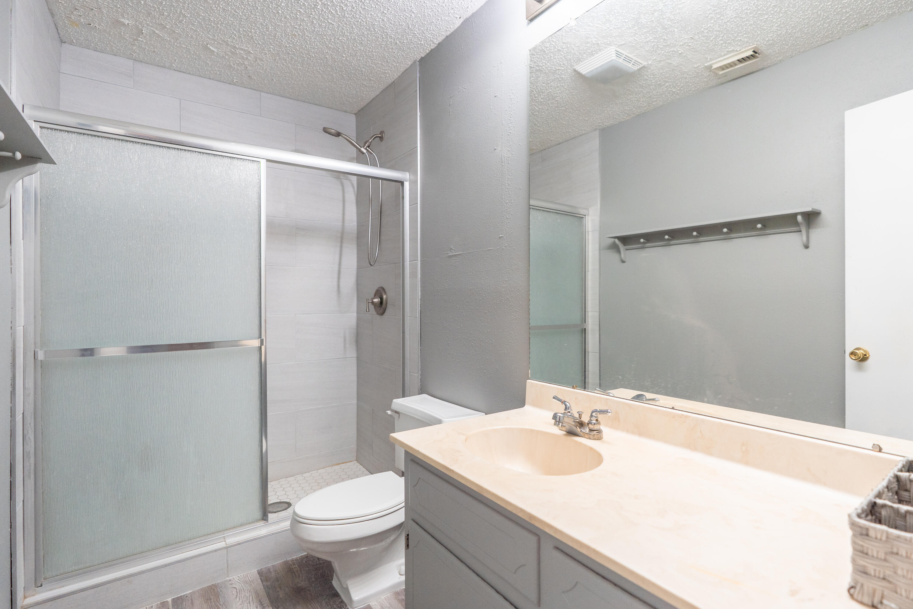 512 North Grover Avenue Lubbock, TX 79416 - Photo 28 of 34 a bathroom with a sink toilet and shower