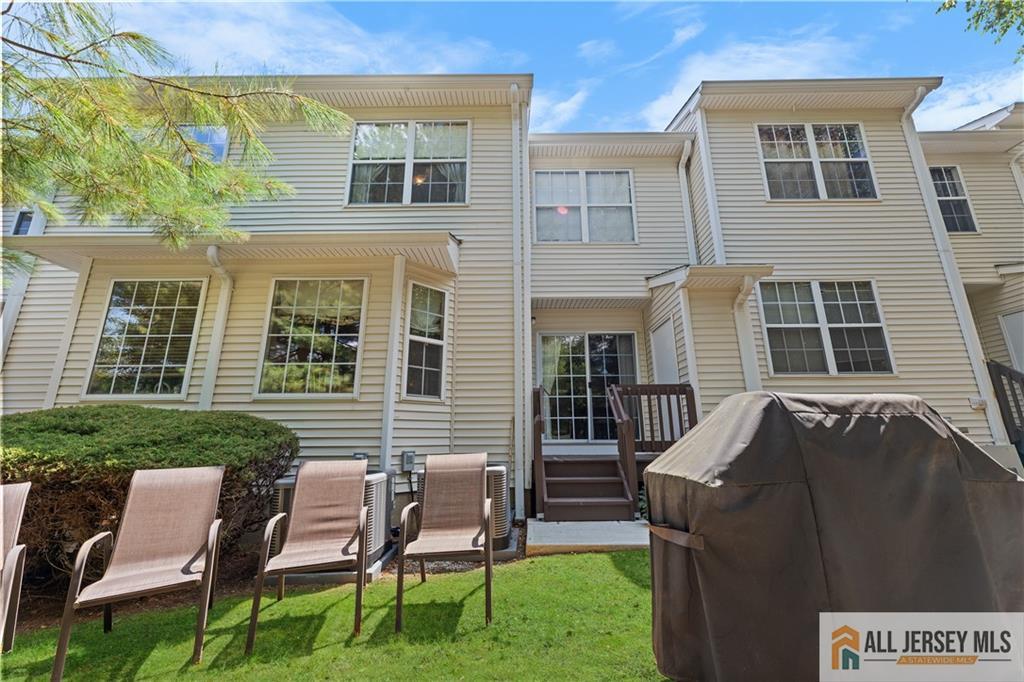 28 Garfield Way Princeton, NJ 08540 - Photo 25 of 39 a view of a house with a yard and sitting area