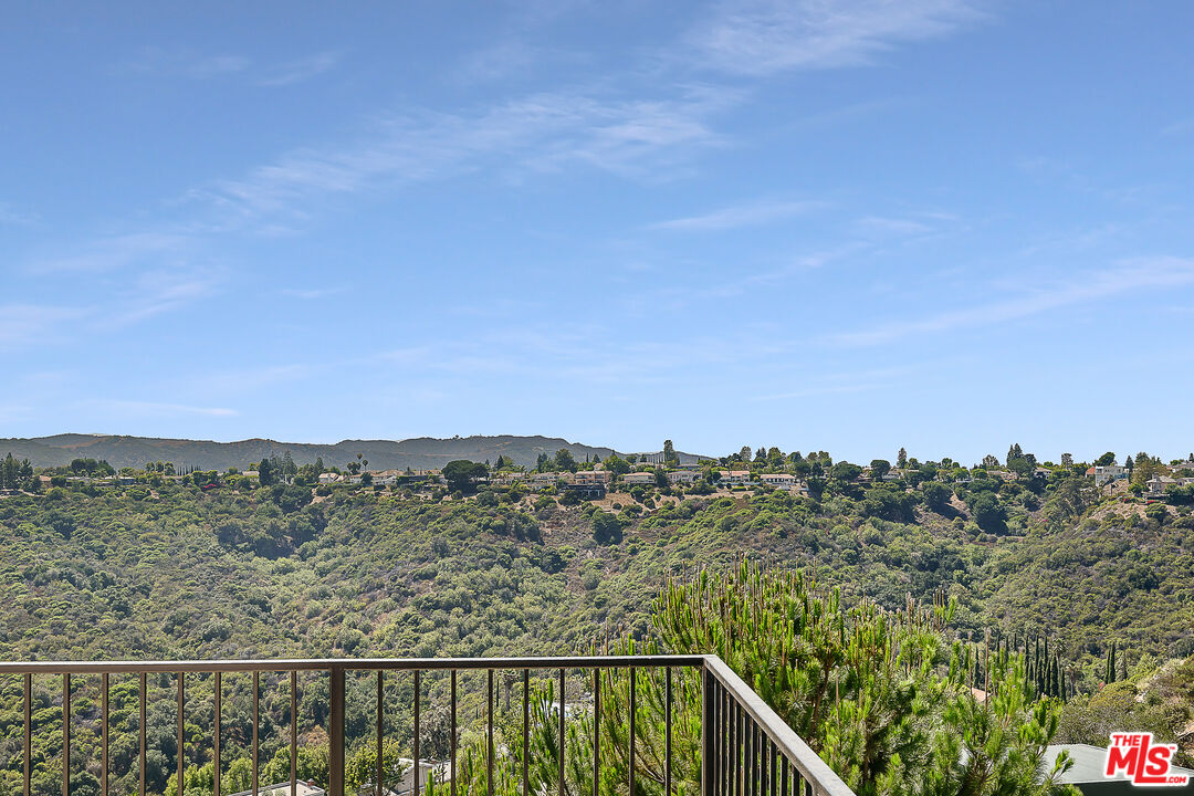 2385 Roscomare Road Los Angeles, CA 90077 - Photo 32 of 38 a view of a city and mountain