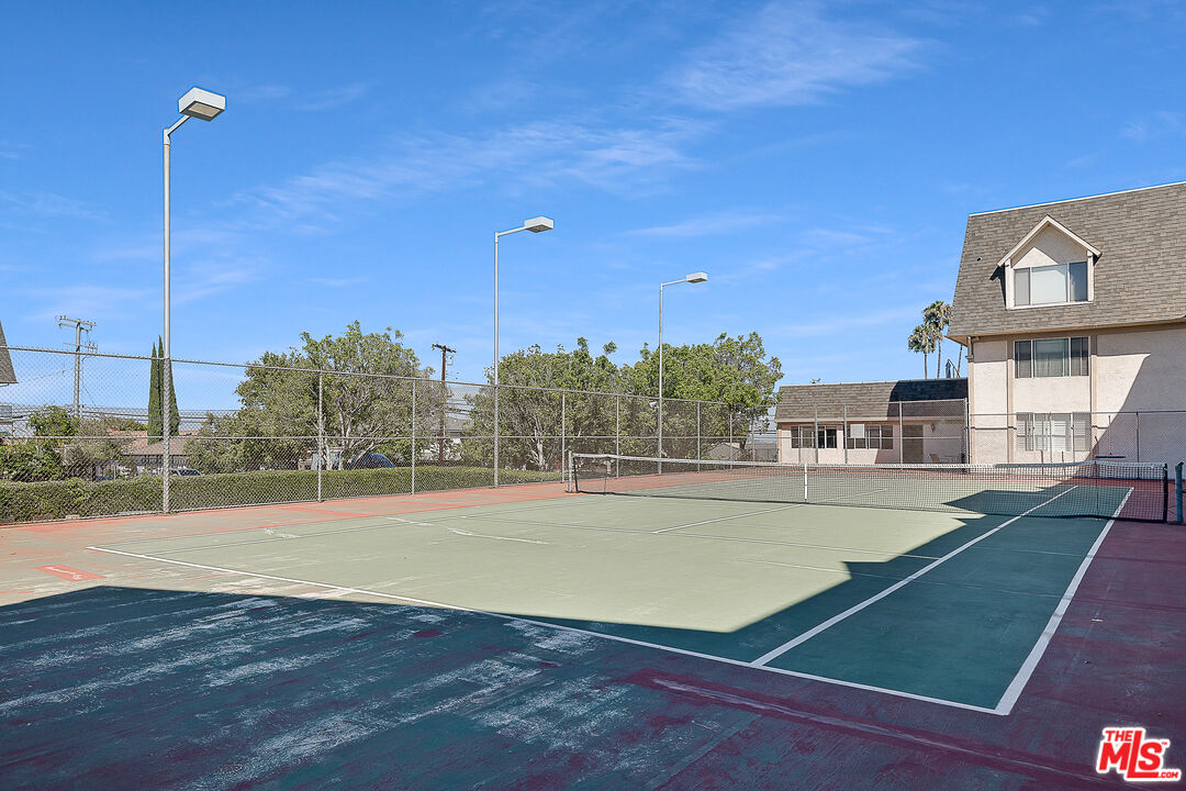 2385 Roscomare Road Los Angeles, CA 90077 - Photo 38 of 38 a view of a room with wooden floor and city view