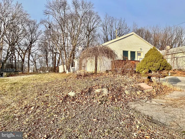 a front view of house with a yard